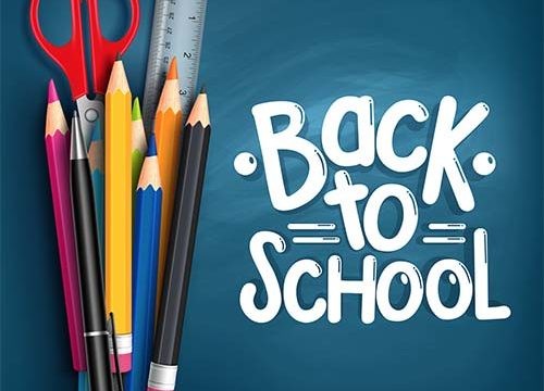 The words back-to-school written on chalkboard with photo of pencils and scissors