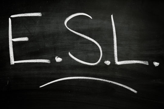 ‘ESL’ written on a chalkboard.